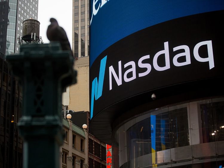Apple down, Tesla falls on production loss worries