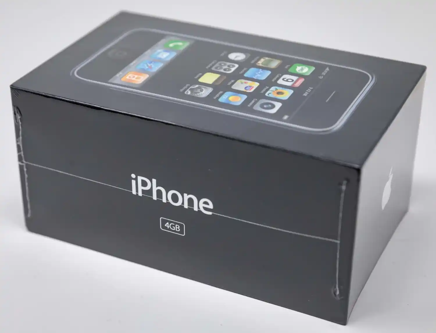 Rare 20-year Apple employee award up for auction alongside uncirculated original iPhone